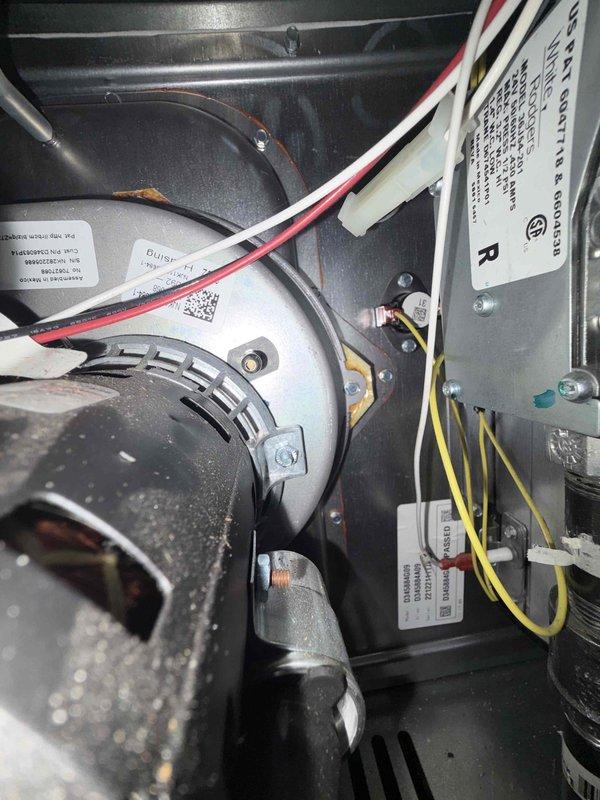 # HVAC Service Report

Responded to no heat call on residential furnace system. Upon inspection, found evaporator coil completely frozen with heavy ice accumulation covering all fins. Blower motor was operational and circulating air, but system unable to provide heat due to frozen coil condition blocking proper airflow and heat exchange.

Diagnosed issue as improper system operation causing cooling mode activation instead of heating mode, likely due to reversing valve malfunction or thermostat wiring issue. Ice buildup indicated system had been running in cooling cycle, causing refrigerant to flow through evaporator coil and freeze condensation. Placed collection bucket to capture melt water from coil during defrost process.

Recommended allowing complete defrost of evaporator coil before further diagnostics and potential repair or replacement of faulty components to restore proper heating operation.