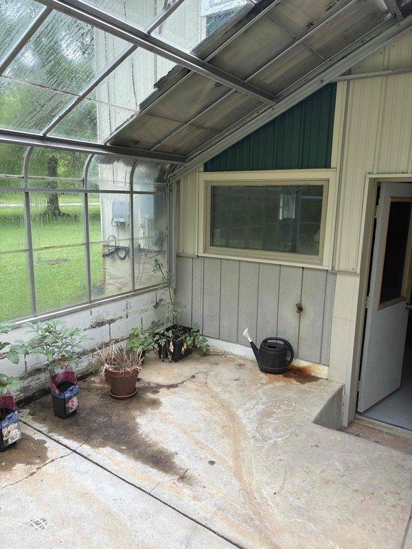 Conducted on-site evaluation for additional mini split installation in residential property. Assessed interior bedroom space and enclosed sunroom area to determine optimal placement for new ductless heat pump unit. Documented room dimensions and existing conditions, including 6,000 BTU capacity requirements for bedroom installation. Evaluated electrical access, exterior wall penetration points, and conduit routing options for refrigerant lines and condensate drainage. Photographed proposed indoor unit locations and potential outdoor condenser placement to prepare comprehensive installation estimate.