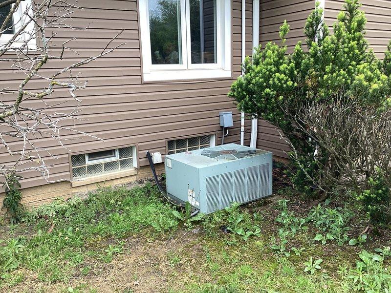 Conducted estimate for complete HVAC system replacement at residential property with 20+ year old furnace and non-operational air conditioning system. Assessed existing outdoor condensing unit, electrical service panel, and current system configuration to provide comprehensive replacement recommendations for both heating and cooling equipment.