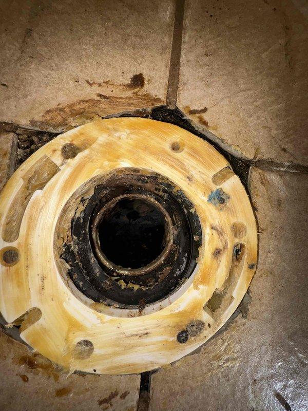 Responded to a service call for a leaking toilet with concerns about water damage to the ceiling below. Inspected the toilet tank components, including the fill valve, flush valve assembly, and flapper mechanism, and examined the toilet base and floor flange for signs of water infiltration. Documented the condition of the internal tank components and the wax ring seal area to determine the source of the leak and recommend appropriate repairs.