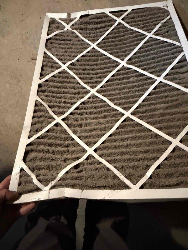 Responded to no-cooling call on 4-year-old residential AC system with outdoor unit failing to operate. Upon arrival, performed system diagnostics and discovered heavily soiled air filter restricting airflow to the air handler. Replaced clogged filter with new pleated media filter, restoring proper system airflow. Verified outdoor unit operation, confirmed adequate cooling capacity, and tested system performance across all zones. System returned to normal operation with proper temperature differential and airflow restored throughout the home.
