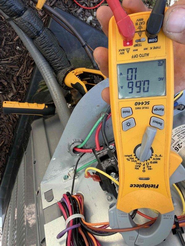 Completed routine A/C tune-up on 2-year-old air conditioning system operating properly with no reported issues. Performed comprehensive electrical diagnostics using digital multimeter to verify voltage and amperage readings at outdoor unit control board and compressor circuit. All electrical measurements within manufacturer specifications. Inspected wire connections, terminals, and control components for proper operation and secure mounting. System tested and confirmed functioning correctly upon completion of preventive maintenance service.