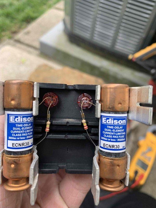 Completed cooling maintenance inspection on outdoor HVAC unit. Inspected electrical components including capacitor, contactor, and wiring connections; all components found in good operating condition. Verified proper function of time-delay dual-element fuses (Edison ECNR30 Class RK5). Customer's maintenance agreement requires renewal.