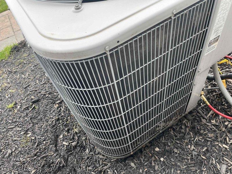 Completed scheduled maintenance on 11-year-old Carrier air conditioning system per maintenance contract. Performed comprehensive AC tune-up including electrical diagnostics using digital multimeter to verify voltage readings at 237V on control circuit components. Inspected and tested capacitor, contactor relay, and associated wiring connections within control panel. Evaluated outdoor condenser unit condition, verified proper operation of condenser coil and fan assembly, and confirmed unit is mounted securely on pad with adequate clearance. All components operating within normal parameters with no immediate service needs identified.