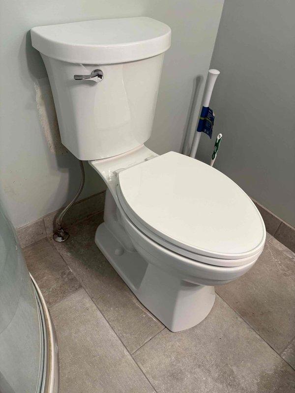 Responded to a service call for a toilet experiencing gurgling sounds after a rag was inadvertently flushed during a previous toilet reset. Inspected the fixture and surrounding plumbing connections, verified proper toilet installation and water supply line connection, and assessed the drainage system for potential blockages. The toilet was found to be properly seated on the flange with adequate wax ring seal, and all visible components were functioning correctly at the time of inspection.