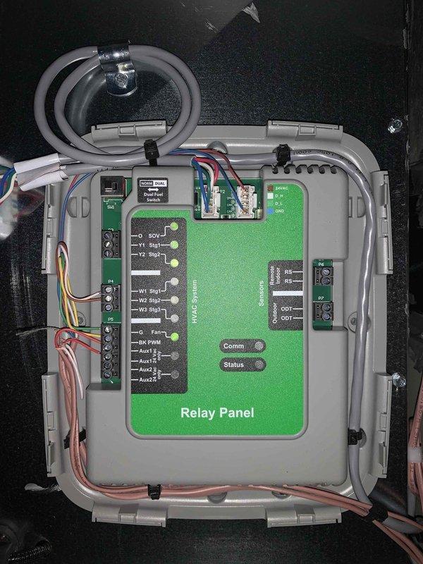 # HVAC Service Report

Responded to no-cool complaint on newly installed air conditioning system. Upon arrival, accessed system diagnostics through thermostat interface and reviewed daily runtime data showing minimal compressor operation with only 18% runtime on Tuesday and 0% on remaining days of the week. Outdoor and indoor temperature readings indicated system was not cycling properly despite adequate temperature differential for cooling demand.

Inspected relay panel and control board wiring connections inside air handler cabinet. Verified all low-voltage connections at terminal blocks were secure and properly seated. Checked relay panel status indicators and communication between thermostat and HVAC control board. System controls and relay outputs appeared properly configured with no visible damage to circuit boards or wiring harnesses.

System successfully restored to normal operation with proper cooling cycle established.