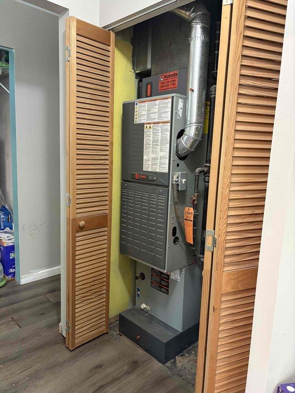 Conducted on-site evaluation for mini split air handler installation at property with existing Trane furnace system. Assessed current HVAC configuration including furnace location in closet space, existing ductwork routing, and available installation areas for proposed mini split equipment. Documented equipment access points, electrical service availability, and optimal placement options for indoor air handler units to supplement existing forced air heating system.