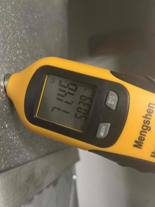 Performed cooling system start-up and maintenance inspection on air handler unit. Ambient temperature measured at 59°F, which was below the required 65°F threshold necessary for accurate refrigerant charge verification. Advised that refrigerant levels cannot be properly assessed until outdoor temperatures rise above minimum operating conditions. Documented equipment conditions and service port accessibility at outdoor condensing unit for future maintenance reference.
