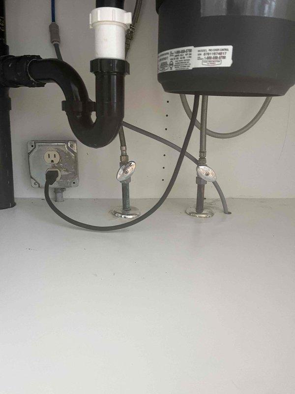Responded to service call for low hot water flow at kitchen faucet. Upon inspection, found reduced hot water pressure affecting faucet performance. Examined water heater installation and supply line connections to diagnose flow restriction. Identified issue with hot water supply affecting delivery to the double-basin kitchen sink fixture. Performed necessary adjustments to restore proper hot water flow and pressure to the faucet assembly. Verified both hot and cold water lines functioning correctly at completion. System tested and confirmed adequate flow restored to kitchen faucet.