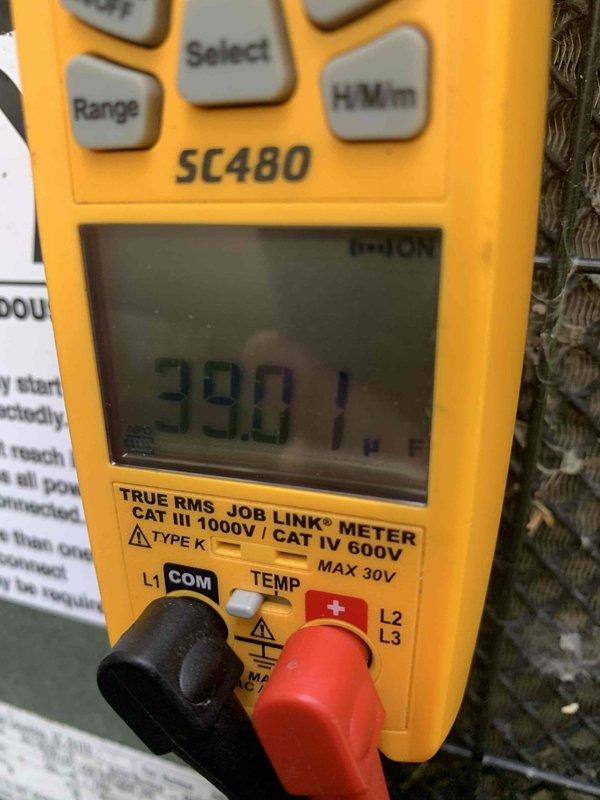 Completed routine cooling maintenance member visit on air handler system. Performed comprehensive system diagnostics using digital multimeter, recording voltage readings of 390.1V to verify proper electrical operation and system performance. Inspected exterior equipment connections and utility line runs along building exterior to ensure secure mounting and proper installation standards were maintained throughout the service visit.