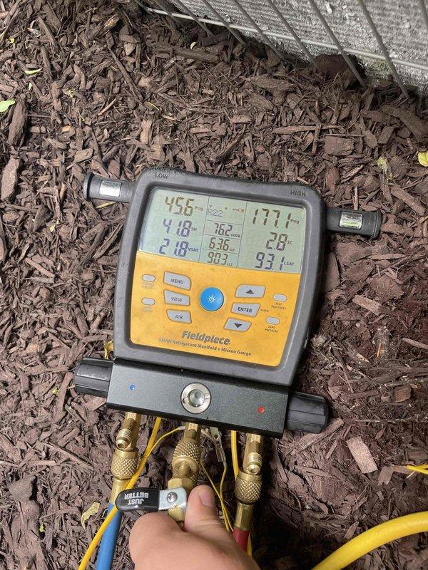 Completed cooling maintenance for club member on air handler system. Performed electrical diagnostics using clamp meter, recording amperage draw of 18.9 amps at the outdoor unit disconnect panel. Conducted refrigerant system analysis with digital manifold gauges, documenting system pressures and temperatures to verify proper refrigerant charge and system operation. All measurements fell within manufacturer specifications for the Lennox unit. System operating normally with no deficiencies noted.