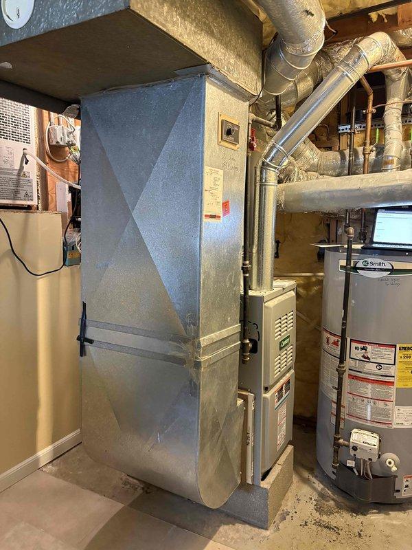 Responded to emergency service call for completely flat HVAC system. Upon inspection, confirmed total refrigerant loss and assessed existing furnace and outdoor condensing unit. Provided comprehensive replacement estimate for new HVAC system installation to restore climate control functionality.