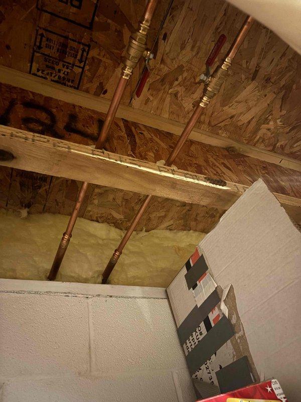 Rebuilt three outdoor water spigots to restore proper function and prevent leaks. Accessed interior shut-off valves in basement utility space and replaced worn valve components, seats, and washers on exterior hose bibs mounted to vinyl siding.