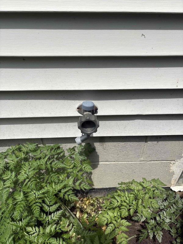Rebuilt three outdoor water spigots to restore proper function and prevent leaks. Accessed interior shut-off valves in basement utility space and replaced worn valve components, seats, and washers on exterior hose bibs mounted to vinyl siding.