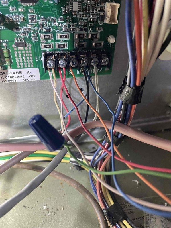 Responded to no cooling complaint on 15-year-old air conditioning system. Upon inspection, diagnosed failed control board causing complete loss of system operation. Replaced defective circuit board assembly and reconnected all low-voltage control wiring to new board. Verified proper wire terminations at terminal blocks, tested all electrical connections, and confirmed system restored to normal cooling operation.