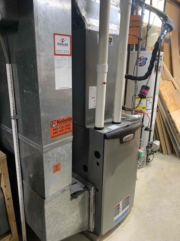Completed cooling maintenance club visit on Bryant HVAC system. Performed comprehensive inspection of furnace, air handler, and associated components including condensate drain lines, electrical connections, and refrigerant piping. All equipment found operating within normal parameters with proper labeling and safety stickers in place.