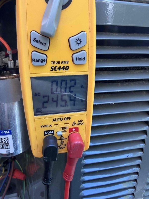 Completed cooling maintenance on three systems for club member. Performed diagnostic testing using digital multimeter to measure voltage and amperage readings on HVAC components, including capacitor testing which showed normal operating parameters. One air handler unit continues to exhibit refrigerant leak despite previous service attempts. System was evaluated and documented with photos showing electrical measurements and component conditions. Service appointment has been rescheduled to address the ongoing leak issue and complete necessary repairs.