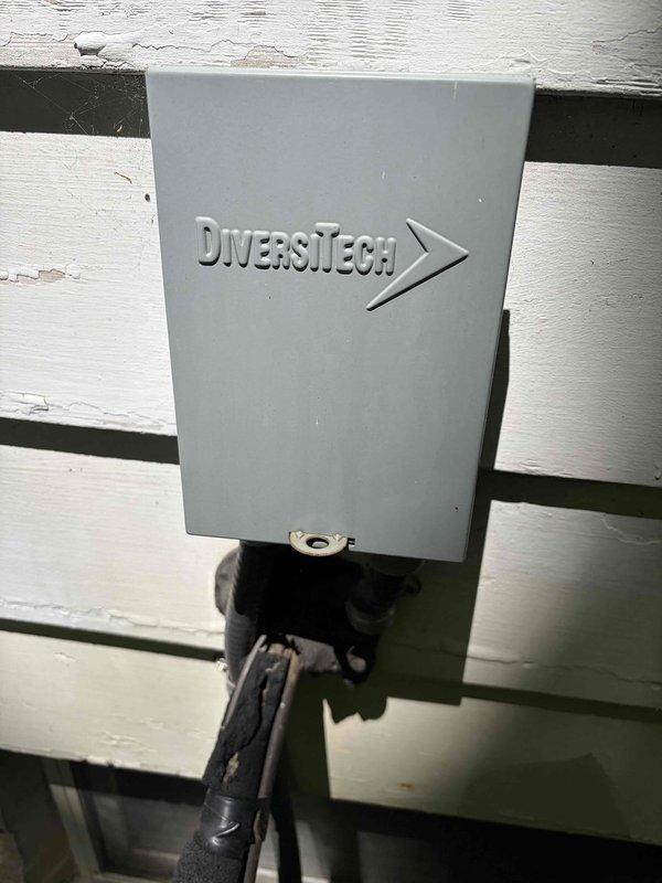 Responded to no cooling call for dual HVAC system where neither unit would turn on despite thermostats displaying power with fresh batteries. Upon arrival, verified 244.4 VAC present at outdoor disconnect using digital multimeter, confirming electrical supply to condensing units. Inspected both systems for visible ice formation on refrigerant lines and coils. Diagnosed electrical failure preventing compressor operation on both units and performed necessary repairs to restore cooling function to both systems.
