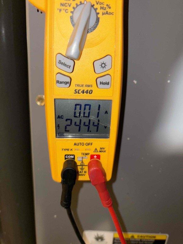 Responded to no cooling call for dual HVAC system where neither unit would turn on despite thermostats displaying power with fresh batteries. Upon arrival, verified 244.4 VAC present at outdoor disconnect using digital multimeter, confirming electrical supply to condensing units. Inspected both systems for visible ice formation on refrigerant lines and coils. Diagnosed electrical failure preventing compressor operation on both units and performed necessary repairs to restore cooling function to both systems.