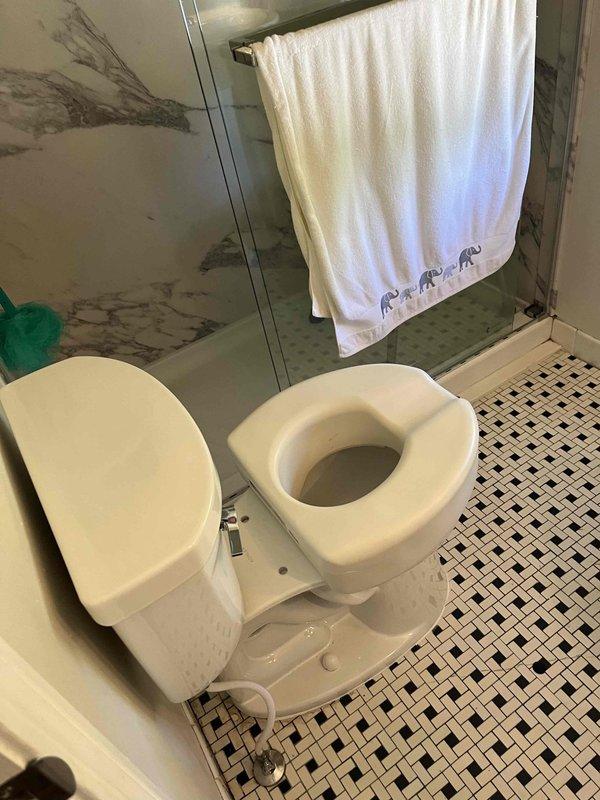 Responded to service call for non-functioning garbage disposal and leaking upstairs bathtub faucet in residential property being prepared for sale. Inspected kitchen garbage disposal unit and diagnosed electrical or mechanical failure requiring replacement or repair. Evaluated upstairs bathroom three-handle chrome faucet fixture and identified active leak requiring washer replacement or cartridge service. Documented existing bathroom conditions including aged tile grout, fixture wear, and tub surface staining for customer records prior to property listing.