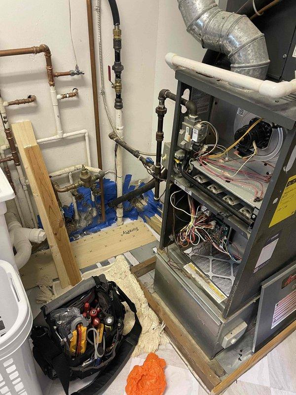 Responded to service call for air conditioning system triggering furnace fuse when activated. Performed diagnostic inspection of 5-year-old AC system and furnace unit. Identified electrical fault causing cross-circuit interference between cooling and heating systems. Inspected furnace electrical components, wiring connections, and circuit board for damage or improper connections. Traced wiring to locate source of electrical conflict. Corrected faulty wiring configuration and verified proper circuit isolation between AC and furnace systems. Tested system operation to confirm AC unit functions without triggering furnace circuit breaker. Completed standard AC tune-up service including filter inspection, electrical connection verification, and operational testing. System restored to normal operation with cooling and heating systems functioning independently as designed.