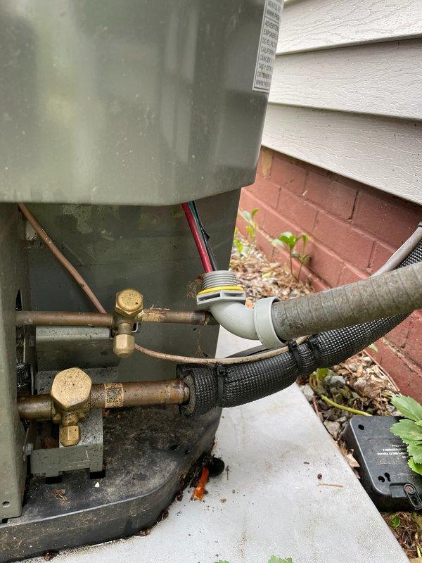 Completed HVAC club membership renewal and maintenance inspection. During evaluation of outdoor condensing unit, identified exposed electrical wiring at air handler requiring attention for safety compliance. Documented equipment condition including refrigerant line connections, service ports, and outdoor unit installation. Interior inspection revealed air handler with significant frost accumulation on evaporator coil and surrounding components, indicating potential airflow restriction, refrigerant charge issue, or system malfunction. Filter showed signs of stress and deformation. Captured photographic documentation of exposed wiring hazard and abnormal frost buildup for customer records and future service reference.