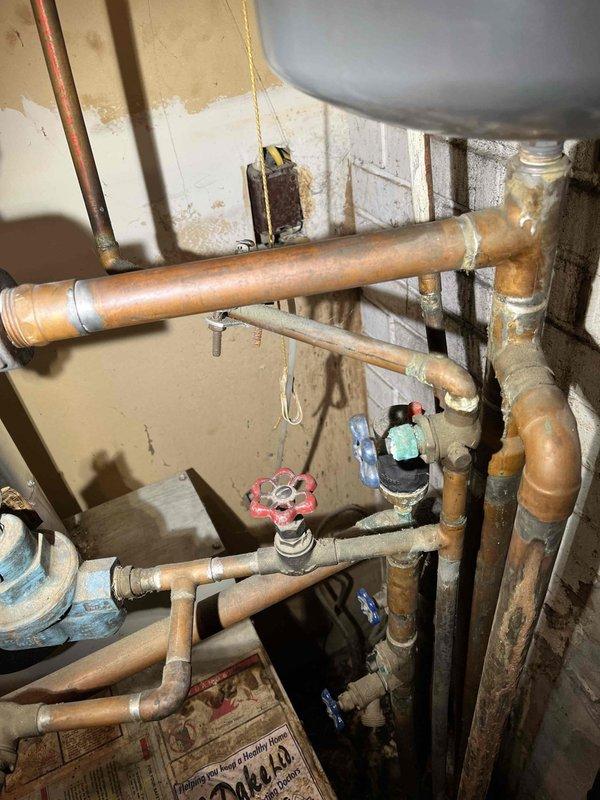Responded to a water leak originating from the refrigerator supply line. Upon inspection, identified a compromised connection at the copper tubing interface with the appliance feed line. Shut off the water supply at the nearest isolation valve, removed the damaged flexible connector, and installed a new compression fitting with proper sealing. Tested the system under full pressure to verify leak elimination and proper water flow to the refrigerator ice maker and dispenser.