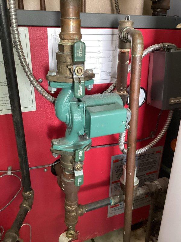 Completed estimate for replacement of existing residential water heating system. Evaluated current setup including aged water heater with expansion tank, circulator pump, and associated copper piping showing oxidation and wear. Provided comprehensive replacement options for Navien tankless water heater system as referral recommendation, including removal of existing equipment and installation of new high-efficiency unit with updated venting, gas lines, and water connections to meet current code requirements.