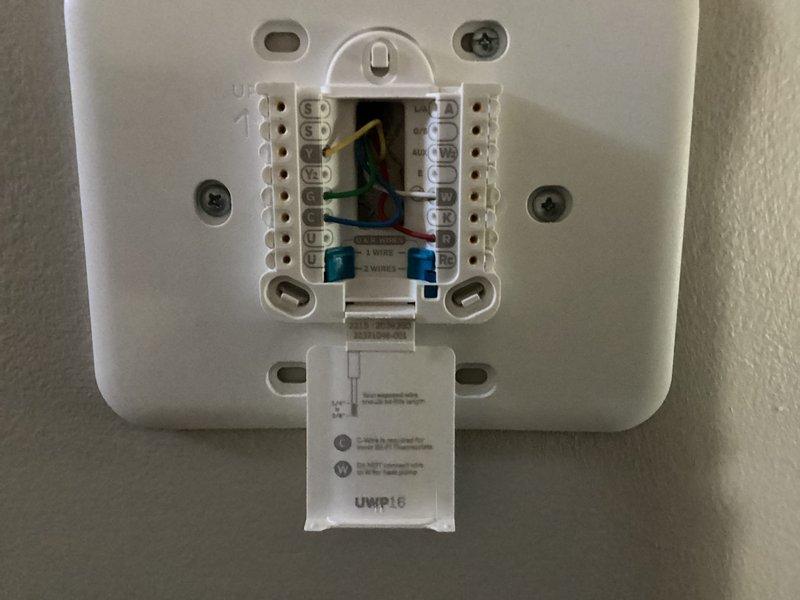 Conducted on-site evaluation for HVAC system replacement options. Assessed existing thermostat wiring configuration and documented current control system setup, including wire terminations and connection points. Photographed equipment locations and existing infrastructure to provide comprehensive replacement recommendations.