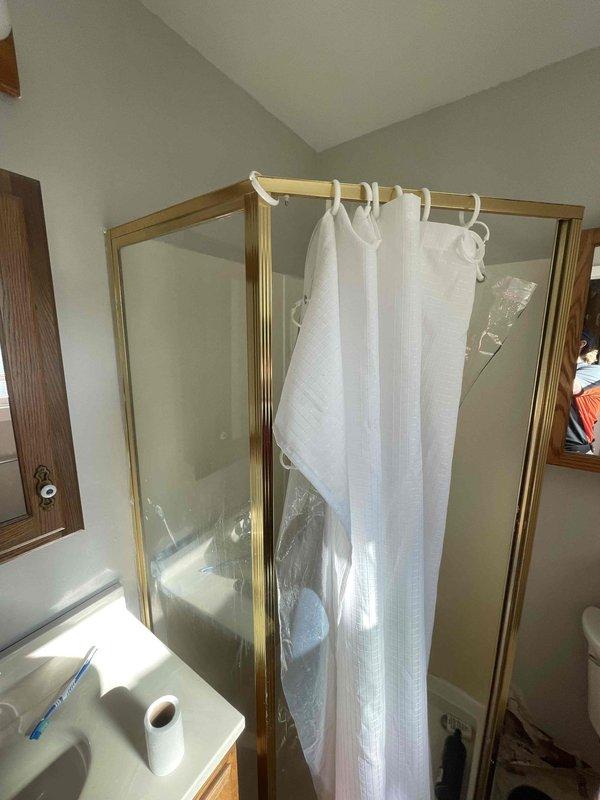 Responded to water leak call at residential property. Upon inspection of bathroom facilities, identified source of moisture issue and completed necessary repairs to plumbing fixtures. Verified proper operation of shower enclosure, checked all connections and seals, and confirmed no active leaks present. All fixtures tested and functioning properly upon completion.
