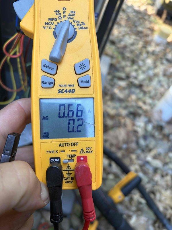 Completed HVAC club membership renewal during air handler maintenance visit. Performed electrical system inspection, verifying proper amperage draw of 0.66 amps and checking dual element time-delay fuses (TR35R, 35A 250V AC) which were found to be in good working condition. All electrical components tested and confirmed operational within manufacturer specifications.