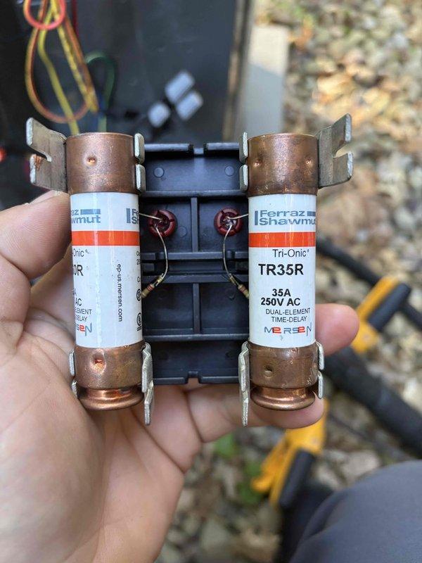 Completed HVAC club membership renewal during air handler maintenance visit. Performed electrical system inspection, verifying proper amperage draw of 0.66 amps and checking dual element time-delay fuses (TR35R, 35A 250V AC) which were found to be in good working condition. All electrical components tested and confirmed operational within manufacturer specifications.