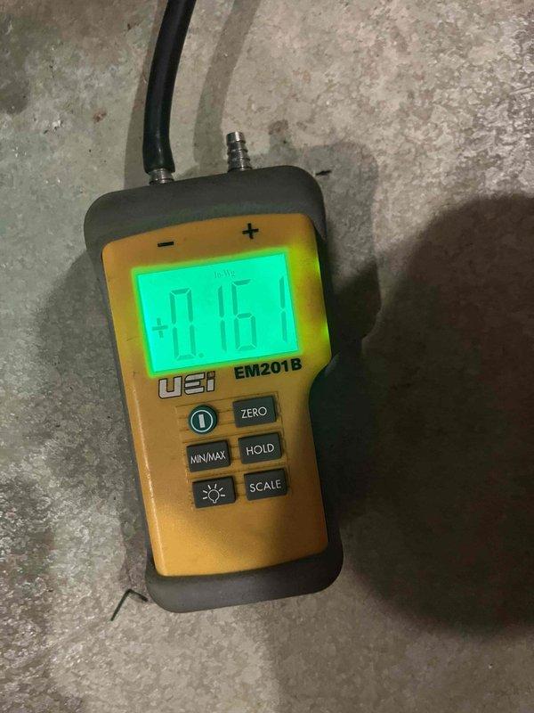 Responded to callback for inadequate cooling with basement overcooling. Upon arrival, performed static pressure diagnostics using UEi EM201B digital manometer. Measured return air static pressure at -0.16" WC and supply static pressure at -0.43" WC, indicating airflow imbalance in ductwork system. Identified zoning or damper issue causing excessive airflow to basement zone while restricting flow to upper levels. Adjusted dampers to rebalance system airflow distribution, ensuring proper cooling throughout all living spaces.