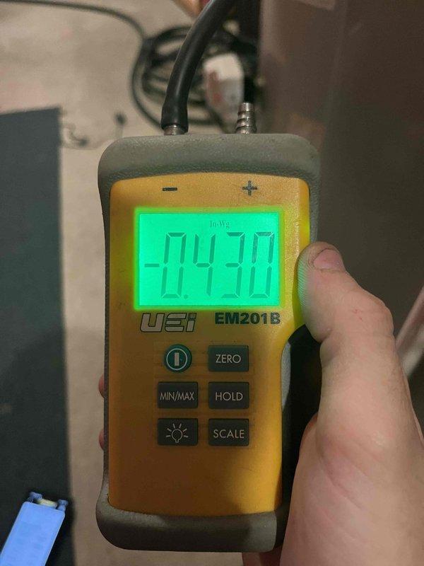 Responded to callback for inadequate cooling with basement overcooling. Upon arrival, performed static pressure diagnostics using UEi EM201B digital manometer. Measured return air static pressure at -0.16" WC and supply static pressure at -0.43" WC, indicating airflow imbalance in ductwork system. Identified zoning or damper issue causing excessive airflow to basement zone while restricting flow to upper levels. Adjusted dampers to rebalance system airflow distribution, ensuring proper cooling throughout all living spaces.