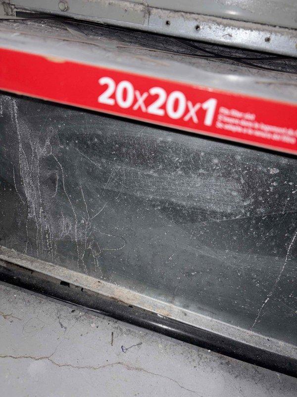 Completed comprehensive tune-up on 18-year-old heat pump system that had not been serviced since 2021. Replaced heavily soiled 20x20x1 air filter that showed significant dust accumulation and debris buildup. Performed electrical diagnostics using digital multimeter, recording amperage draw of 0.67A on compressor circuit, which falls within normal operating parameters for the unit. System tested and confirmed operational with no deficiencies noted at time of service.