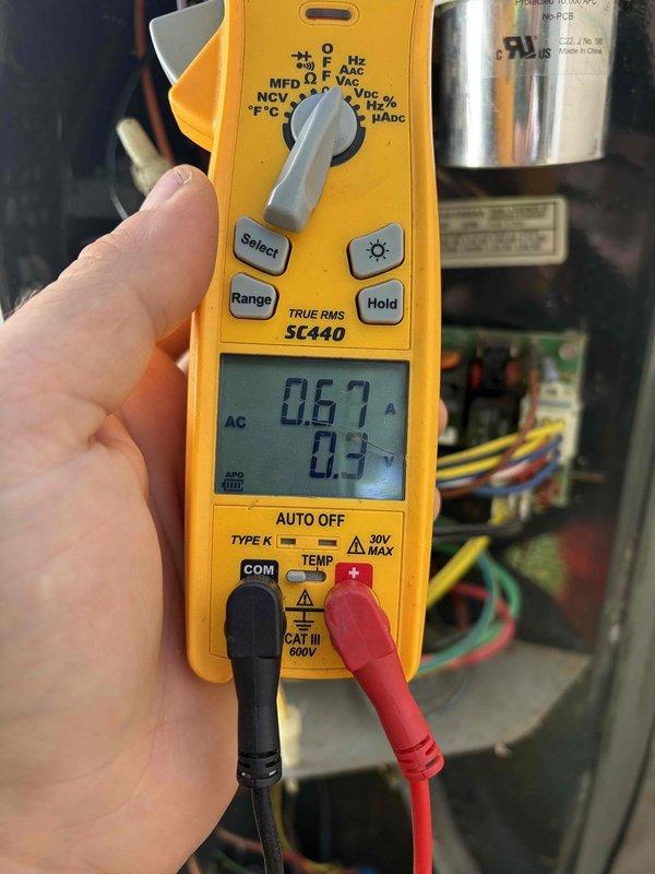 Completed comprehensive tune-up on 18-year-old heat pump system that had not been serviced since 2021. Replaced heavily soiled 20x20x1 air filter that showed significant dust accumulation and debris buildup. Performed electrical diagnostics using digital multimeter, recording amperage draw of 0.67A on compressor circuit, which falls within normal operating parameters for the unit. System tested and confirmed operational with no deficiencies noted at time of service.