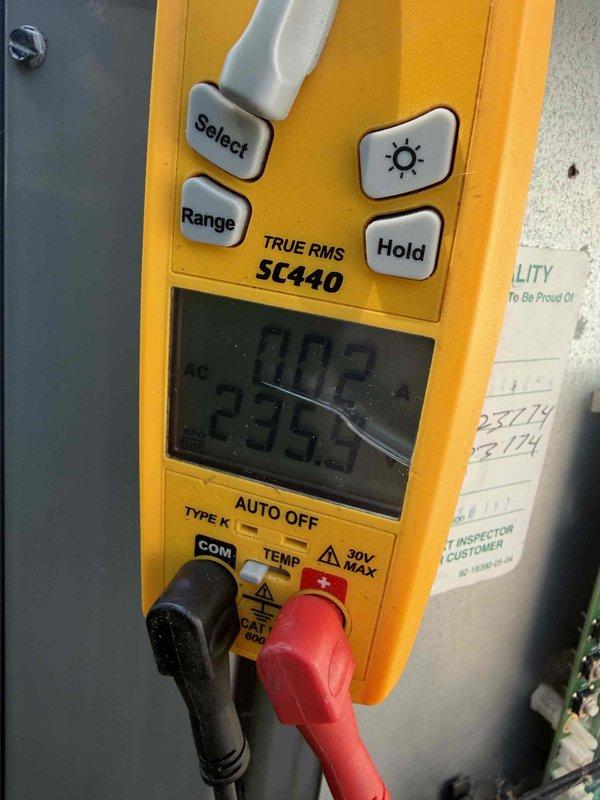 Completed comprehensive tune-up on air handler unit. Inspected and tested contactor for proper operation, verified electrical connections and terminal integrity, and confirmed voltage readings at 233.3V using calibrated multimeter. All components found operating within normal parameters.