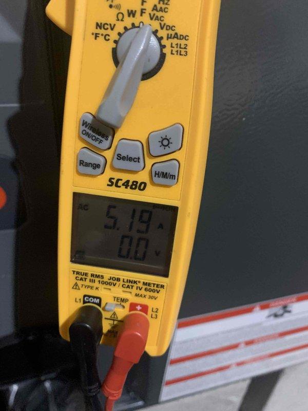 Completed prepaid club maintenance visit on air handler unit. Inspected dual-run capacitor showing 50/5 MFD rating at 50/60Hz with multiple wire connections (red, purple, orange, yellow, brown) all secure at terminals. Measured compressor amperage at 5.14 amps AC using calibrated multimeter, reading within normal operating parameters. Capacitor physically marked for tracking purposes. All electrical connections tight and secure, no signs of overheating or degradation noted. Unit operating properly with no issues found during inspection.