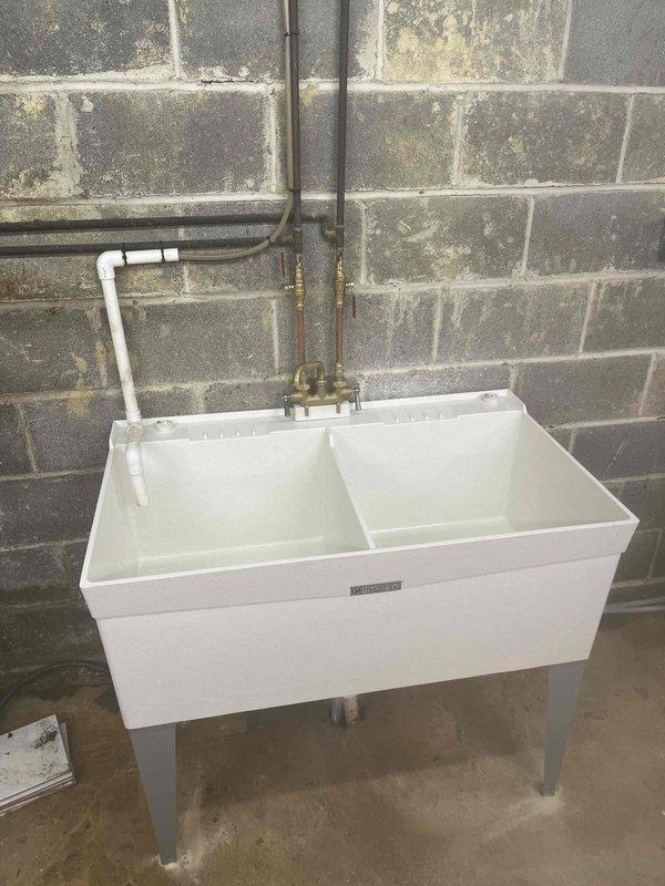 Completed follow-up visit for plumbing repair bundle service. Inspected and verified proper installation and functionality of kitchen sink P-trap assembly, drain connections, and braided supply lines, as well as utility sink plumbing system including PVC drainage and supply valve configuration. All connections remain secure with no leaks detected, confirming successful completion of previous repair work.