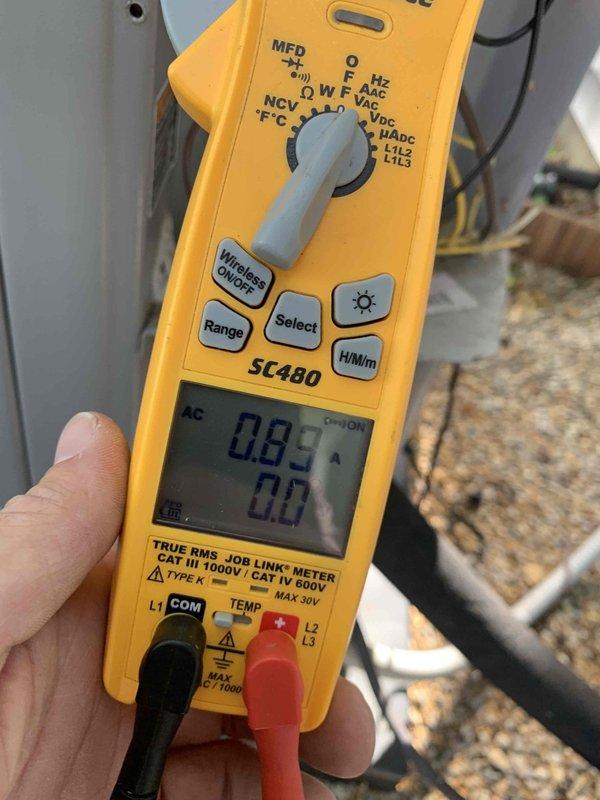 Replaced failed condenser fan motor and fan blades on outdoor HVAC unit. Verified proper motor operation and electrical readings using digital multimeter, confirming system returned to normal operating parameters.
