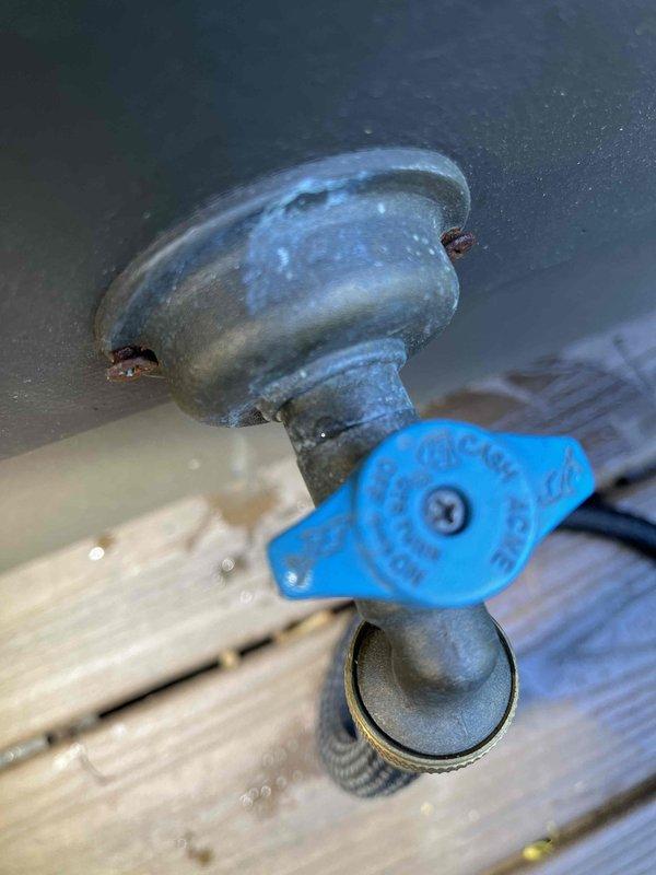Responded to service call for outdoor hose bib that sustained freeze damage over winter. Upon arrival, assessed heavily corroded exterior spigot assembly with compromised internal components due to ice expansion. Removed failed brass elbow fitting and damaged freeze-proof valve body from exterior wall mounting. Installed replacement frost-proof sillcock with integrated backflow prevention and new quarter-turn ball valve shutoff for enhanced seasonal maintenance access. Tested system for proper operation and verified no leaks at connection points.