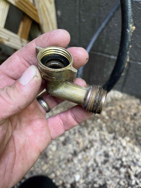 Responded to service call for outdoor hose bib that sustained freeze damage over winter. Upon arrival, assessed heavily corroded exterior spigot assembly with compromised internal components due to ice expansion. Removed failed brass elbow fitting and damaged freeze-proof valve body from exterior wall mounting. Installed replacement frost-proof sillcock with integrated backflow prevention and new quarter-turn ball valve shutoff for enhanced seasonal maintenance access. Tested system for proper operation and verified no leaks at connection points.