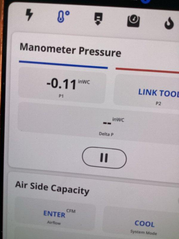 Returned to property to replace undersized condensate pump with larger capacity unit as previously specified. Removed existing pump and installed upgraded model to ensure proper condensate removal and prevent overflow issues. Verified system operation using manometer to measure pressure differentials, confirming negative pressure reading of -0.11 inWC at P1 port. Tested air side capacity parameters and confirmed proper airflow in cooling mode. Documented outdoor condensing unit installation and surrounding area conditions. System left in proper working order with adequate condensate handling capacity.