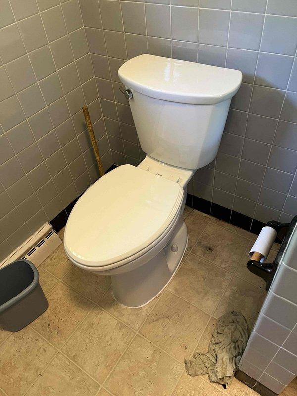 Completed return service call for previously sold Toto toilet installation. Upon inspection, verified proper operation of the two-piece toilet unit, confirmed secure mounting and seal integrity, and documented the installation in the tiled bathroom setting. All plumbing connections were functioning correctly with no leaks detected at the supply line or waste connections.