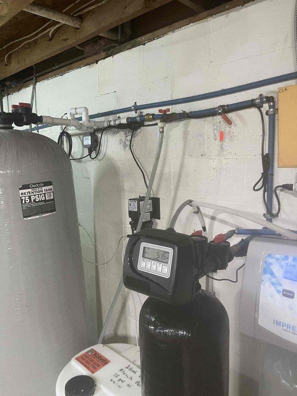 Returned to site to rebed carbon filtration system and install 110V Stenner chemical feed pump with flow switch integration. Verified proper pump operation and flow switch functionality with existing water treatment equipment. System tested and confirmed operational with all components functioning as specified.