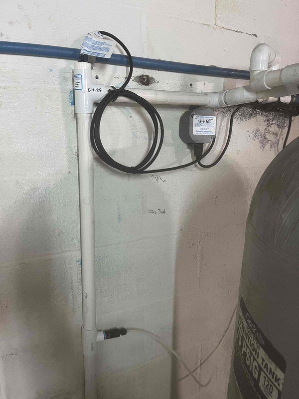 Returned to site to rebed carbon filtration system and install 110V Stenner chemical feed pump with flow switch integration. Verified proper pump operation and flow switch functionality with existing water treatment equipment. System tested and confirmed operational with all components functioning as specified.