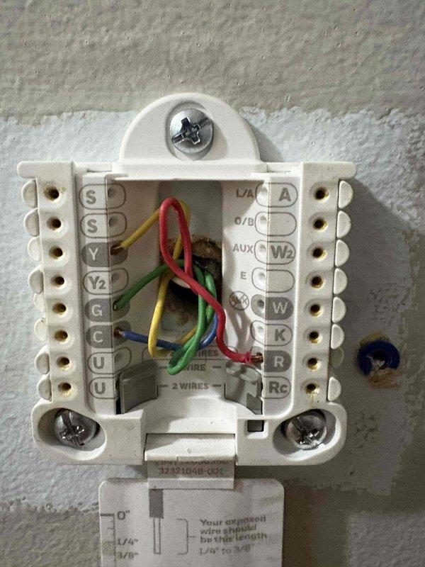 Conducted site evaluation for air conditioning system replacement. Assessed existing thermostat wiring configuration and documented current outdoor condensing unit condition to provide comprehensive replacement options for residential HVAC system upgrade.