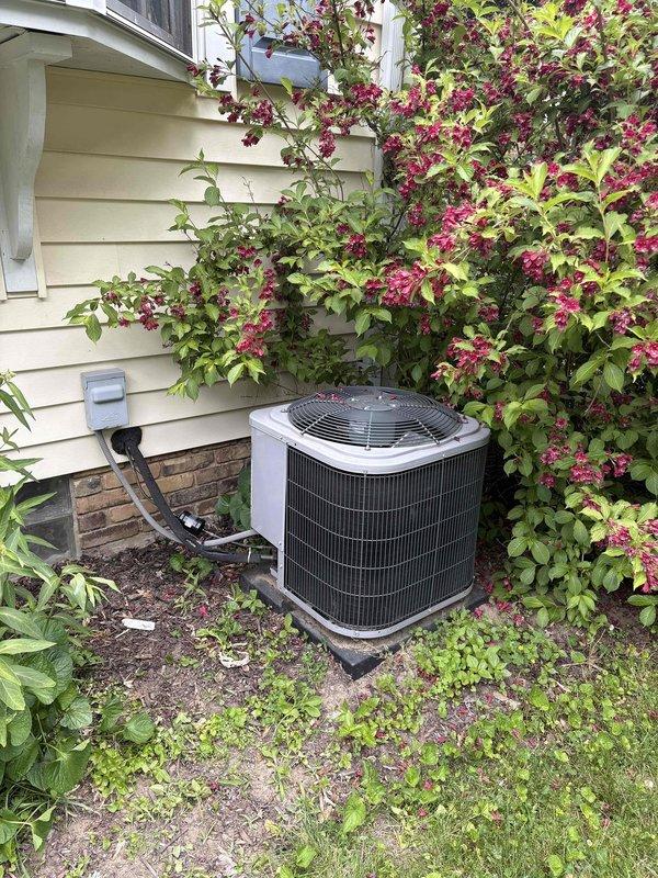 Conducted site evaluation for air conditioning system replacement. Assessed existing thermostat wiring configuration and documented current outdoor condensing unit condition to provide comprehensive replacement options for residential HVAC system upgrade.
