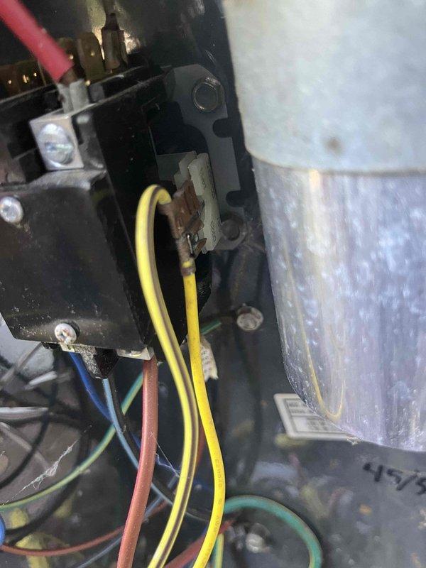 Completed scheduled cooling maintenance for club member's air handler unit. Performed comprehensive inspection of electrical components, noting corrosion and oxidation present on terminal connections and mounting hardware that will require monitoring. Inspected condensate drain system and associated plumbing connections, verifying proper operation of drain line, trap assembly, and safety overflow mechanisms. All system components photographed and documented for maintenance records.
