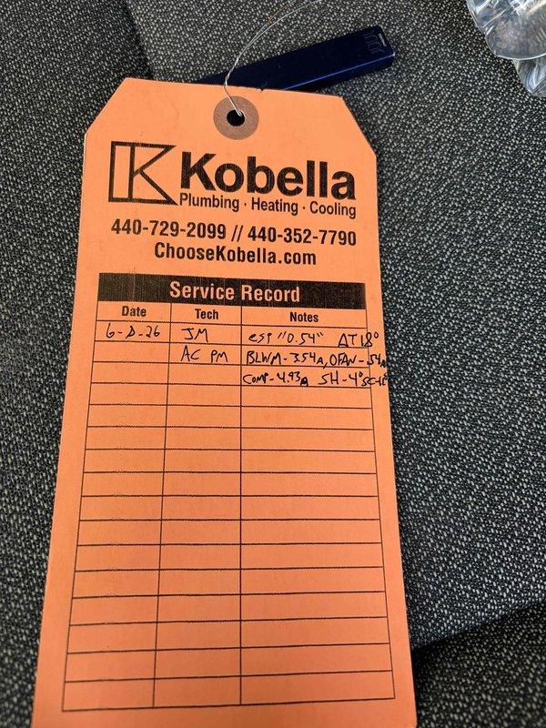 Completed prepaid cooling maintenance visit. Performed electrical diagnostics using digital multimeter, recording voltage and amperage readings on HVAC system components. Documented service findings on company tag and left on-site for customer records.